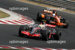 05.08.2007 Budapest, Hungary,  Lewis Hamilton (GBR), McLaren Mercedes, Adrian Sutil (GER), Spyker F1 Team - Formula 1 World Championship, Rd 11, Hungarian Grand Prix, Sunday Race