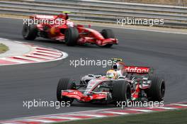 05.08.2007 Budapest, Hungary,  Lewis Hamilton (GBR), McLaren Mercedes, Kimi Raikkonen (FIN), Räikkönen, Scuderia Ferrari - Formula 1 World Championship, Rd 11, Hungarian Grand Prix, Sunday Race