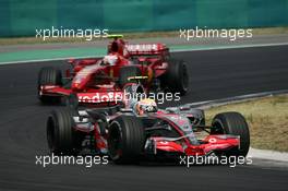 05.08.2007 Budapest, Hungary,  Lewis Hamilton (GBR), McLaren Mercedes, MP4-22 leads Kimi Raikkonen (FIN), Räikkönen, Scuderia Ferrari, F2007 - Formula 1 World Championship, Rd 11, Hungarian Grand Prix, Sunday Race