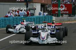 04.08.2007 Budapest, Hungary,  Nick Heidfeld (GER), BMW Sauber F1 Team, F1.07, Robert Kubica (POL), BMW Sauber F1 Team, F1.07 and Lewis Hamilton (GBR), McLaren Mercedes, MP4-22 - Formula 1 World Championship, Rd 11, Hungarian Grand Prix, Saturday Qualifying