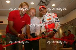 02.08.2007 Budapest, Hungary,  Lewis Hamilton (GBR), McLaren Mercedes with Tamas Kasas (HUN), Water Polo player cutting the ribbon to open the new Vodafone shop, Vodafone Karting and opening of shop in Budapest - Formula 1 World Championship, Rd 11, Hungarian Grand Prix, Thursday