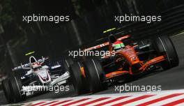 07.09.2007 Monza, Italy,  Sakon Yamamoto (JPN), Spyker F1 Team, F8-VII-B and Robert Kubica (POL), BMW Sauber F1 Team, F1.07 - Formula 1 World Championship, Rd 13, Italian Grand Prix, Friday Practice