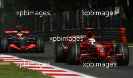 07.09.2007 Monza, Italy,  Felipe Massa (BRA), Scuderia Ferrari, F2007 and Fernando Alonso (ESP), McLaren Mercedes, MP4-22 - Formula 1 World Championship, Rd 13, Italian Grand Prix, Friday Practice