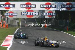 09.09.2007 Monza, Italy,  Mark Webber (AUS), Red Bull Racing, RB3 and Rubens Barrichello (BRA), Honda Racing F1 Team, RA107 - Formula 1 World Championship, Rd 13, Italian Grand Prix, Sunday Race