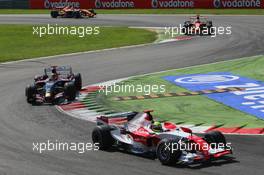 09.09.2007 Monza, Italy,  Ralf Schumacher (GER), Toyota Racing, TF107 and Vitantonio Liuzzi (ITA), Scuderia Toro Rosso, STR02 - Formula 1 World Championship, Rd 13, Italian Grand Prix, Sunday Race