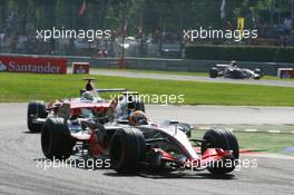 09.09.2007 Monza, Italy,  Lewis Hamilton (GBR), McLaren Mercedes, MP4-22 and Ralf Schumacher (GER), Toyota Racing, TF107 - Formula 1 World Championship, Rd 13, Italian Grand Prix, Sunday Race