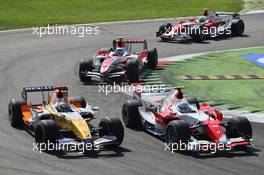 09.09.2007 Monza, Italy,  Jarno Trulli (ITA), Toyota Racing, TF107 and Giancarlo Fisichella (ITA), Renault F1 Team, R27 - Formula 1 World Championship, Rd 13, Italian Grand Prix, Sunday Race