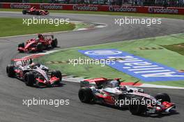 09.09.2007 Monza, Italy,  Fernando Alonso (ESP), McLaren Mercedes, MP4-22 leads Lewis Hamilton (GBR), McLaren Mercedes, MP4-22 and Felipe Massa (BRA), Scuderia Ferrari, F2007 - Formula 1 World Championship, Rd 13, Italian Grand Prix, Sunday Race