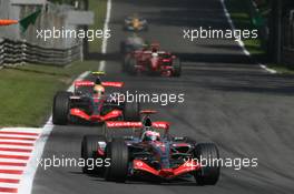 09.09.2007 Monza, Italy,  Fernando Alonso (ESP), McLaren Mercedes, MP4-22 and Lewis Hamilton (GBR), McLaren Mercedes, MP4-22 - Formula 1 World Championship, Rd 13, Italian Grand Prix, Sunday Race