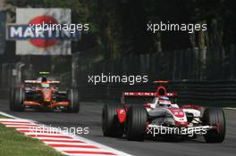 09.09.2007 Monza, Italy,  Takuma Sato (JPN), Super Aguri F1, SA07 and Sakon Yamamoto (JPN), Spyker F1 Team, F8-VII-B - Formula 1 World Championship, Rd 13, Italian Grand Prix, Sunday Race