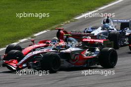 09.09.2007 Monza, Italy,  Lewis Hamilton (GBR), McLaren Mercedes, Felipe Massa (BRA), Scuderia Ferrari at the start - Formula 1 World Championship, Rd 13, Italian Grand Prix, Sunday Race