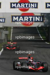 09.09.2007 Monza, Italy,  Fernando Alonso (ESP), McLaren Mercedes, MP4-22 and Lewis Hamilton (GBR), McLaren Mercedes, MP4-22 - Formula 1 World Championship, Rd 13, Italian Grand Prix, Sunday Race