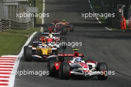 09.09.2007 Monza, Italy,  Anthony Davidson (GBR), Super Aguri F1 Team, SA07 and Giancarlo Fisichella (ITA), Renault F1 Team, R27 - Formula 1 World Championship, Rd 13, Italian Grand Prix, Sunday Race
