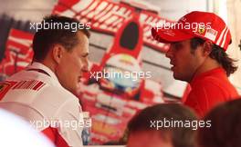 08.09.2007 Monza, Italy,  Michael Schumacher (GER), Scuderia Ferrari, Advisor talks with Felipe Massa (BRA), Scuderia Ferrari - Formula 1 World Championship, Rd 13, Italian Grand Prix, Saturday