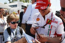08.09.2007 Monza, Italy,  Michael Schumacher (GER), Scuderia Ferrari, Advisor signs autographs - Formula 1 World Championship, Rd 13, Italian Grand Prix, Saturday