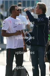 08.09.2007 Monza, Italy,  Nico Rosberg (GER), WilliamsF1 Team checks out Lewis Hamilton (GBR), McLaren Mercedes hair - Formula 1 World Championship, Rd 13, Italian Grand Prix, Saturday