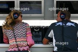 06.09.2007 Monza, Italy,  Girl talking with a Red Bull Racing mechanic - Formula 1 World Championship, Rd 13, Italian Grand Prix, Thursday