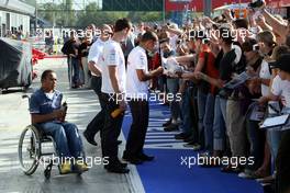 06.09.2007 Monza, Italy,  Lewis Hamilton (GBR), McLaren Mercedes signing autographs to the fans - Formula 1 World Championship, Rd 13, Italian Grand Prix, Thursday