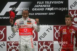 30.09.2007 Gotemba, Japan,  Winner, Lewis Hamilton (GBR), McLaren Mercedes, MP4-22 and 3rd, Kimi Raikkonen (FIN), Räikkönen, Scuderia Ferrari, F2007 - Formula 1 World Championship, Rd 15, Japanese Grand Prix, Sunday Podium