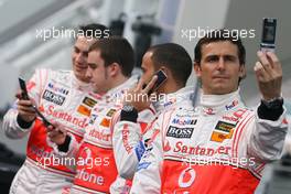 15.01.2007 Valencia, Spain Fernando Alonso (ESP), McLaren Mercedes, Lewis Hamilton (GBR), McLaren Mercedes, Pedro de la Rosa (ESP), Test Driver, McLaren Mercedes, Gary Paffett (GBR), Test Driver, McLaren Mercedes - McLaren Mercedes MP4-22 Launch