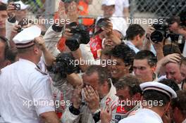 27.05.2007 Monte Carlo, Monaco,  photographers in the spray of the champaign - Formula 1 World Championship, Rd 5, Monaco Grand Prix, Sunday Podium