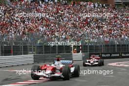 27.05.2007 Monte Carlo, Monaco,  Jarno Trulli (ITA), Toyota Racing, TF107 and Takuma Sato (JPN), Super Aguri F1, SA07 - Formula 1 World Championship, Rd 5, Monaco Grand Prix, Sunday Race