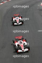 27.05.2007 Monte Carlo, Monaco,  Takuma Sato (JPN), Super Aguri F1, SA07 leads Anthony Davidson (GBR), Super Aguri F1 Team, SA07 - Formula 1 World Championship, Rd 5, Monaco Grand Prix, Sunday Race