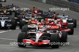 27.05.2007 Monte Carlo, Monaco,  Start, Fernando Alonso (ESP), McLaren Mercedes, MP4-22, Lewis Hamilton (GBR), McLaren Mercedes, MP4-22 and Felipe Massa (BRA), Scuderia Ferrari, F2007 - Formula 1 World Championship, Rd 5, Monaco Grand Prix, Sunday Race