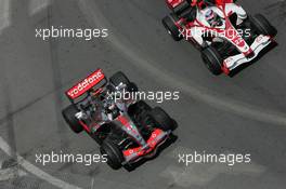 27.05.2007 Monte Carlo, Monaco,  Fernando Alonso (ESP), McLaren Mercedes and Takuma Sato (JPN), Super Aguri F1 - Formula 1 World Championship, Rd 5, Monaco Grand Prix, Sunday Race