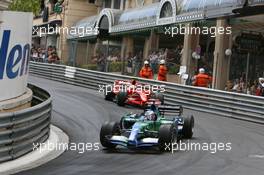 27.05.2007 Monte Carlo, Monaco,  Jenson Button (GBR), Honda Racing F1 Team, RA107 leads Kimi Raikkonen (FIN), Räikkönen, Scuderia Ferrari, F2007 - Formula 1 World Championship, Rd 5, Monaco Grand Prix, Sunday Race