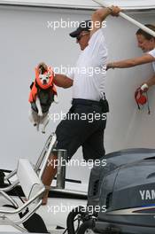 26.05.2007 Monte Carlo, Monaco,  A small and scared looking dog is lifted across a boat - Formula 1 World Championship, Rd 5, Monaco Grand Prix, Saturday