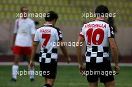 22.05.2006 Monte Carlo, Monaco,  Giancarlo Fisichella (ITA), Renault F1 Team and Felipe Massa (BRA), Scuderia Ferrari - Star Team for Children VS National Team Drivers, Charity Football Match, Louis II Stadium