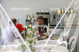 27.05.2007 Monte Carlo, Monaco,  Norbert Haug (GER), Mercedes, Motorsport chief reads Redbulltin - Formula 1 World Championship, Rd 5, Monaco Grand Prix, Sunday