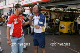 24.05.2007 Monte Carlo, Monaco,  Michael Schumacher (GER), Scuderia Ferrari, Advisor, arrives at the circuit / going to his Team in the Pit Lane - Formula 1 World Championship, Rd 5, Monaco Grand Prix, Thursday