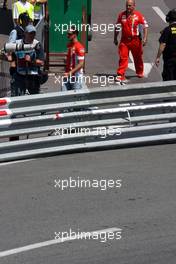 24.05.2007 Monte Carlo, Monaco,  Michael Schumacher (GER), Scuderia Ferrari, Advisor, arrives at the circuit / going to his Team in the Pit Lane - Formula 1 World Championship, Rd 5, Monaco Grand Prix, Thursday