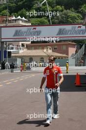 24.05.2007 Monte Carlo, Monaco,  Michael Schumacher (GER), Scuderia Ferrari, Advisor, arrives at the circuit / going to his Team in the Pit Lane - Formula 1 World Championship, Rd 5, Monaco Grand Prix, Thursday