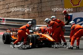 24.05.2007 Monte Carlo, Monaco,  Marshalls remove the crashed car of Adrian Sutil (GER), Spyker F1 Team - Formula 1 World Championship, Rd 5, Monaco Grand Prix, Thursday Practice