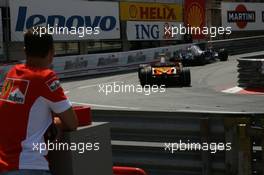 24.05.2007 Monte Carlo, Monaco,  Michael Schumacher (GER), Scuderia Ferrari, Advisor, watches the session from "La Rascasse" corner - Formula 1 World Championship, Rd 5, Monaco Grand Prix, Thursday