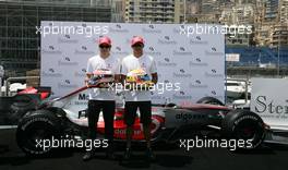 23.05.2007 Monte Carlo, Monaco,  Lewis Hamilton (GBR), McLaren Mercedes and Fernando Alonso (ESP), McLaren Mercedes, with Steinmetz Diamonds in their helmets - Formula 1 World Championship, Rd 5, Monaco Grand Prix, Wednesday