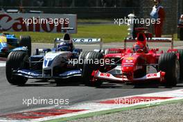10.11.2007 Michael Schumacher Battles on track with Juan Pablo Montoya, 2004 - Michael Schumacher Story
