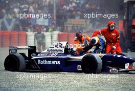 10.11.2007 Track Marshalls seperate Michael Schumacher from Damon Hill after they collided on track during the 1995 British Grand Prix, Silverstone  - Michael Schumacher Story