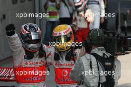 08.04.2007 Kuala Lumpur, Malaysia,  1st place Fernando Alonso (ESP), McLaren Mercedes and 2nd place Lewis Hamilton (GBR), McLaren Mercedes - Formula 1 World Championship, Rd 2, Malaysian Grand Prix, Sunday Podium