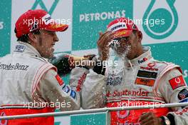 08.04.2007 Kuala Lumpur, Malaysia,  1st place Fernando Alonso (ESP), McLaren Mercedes and 2nd place Lewis Hamilton (GBR), McLaren Mercedes - Formula 1 World Championship, Rd 2, Malaysian Grand Prix, Sunday Podium