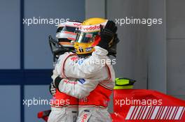 08.04.2007 Kuala Lumpur, Malaysia,  1st place Fernando Alonso (ESP), McLaren Mercedes with 2nd place Lewis Hamilton (GBR), McLaren Mercedes - Formula 1 World Championship, Rd 2, Malaysian Grand Prix, Sunday Podium