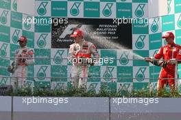 08.04.2007 Kuala Lumpur, Malaysia,  2nd place Lewis Hamilton (GBR), McLaren Mercedes with 1st place Fernando Alonso (ESP), McLaren Mercedes and 3rd place Kimi Raikkonen (FIN), Räikkönen, Scuderia Ferrari - Formula 1 World Championship, Rd 2, Malaysian Grand Prix, Sunday Podium