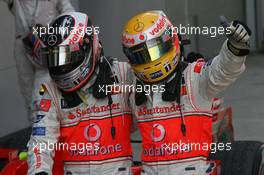 08.04.2007 Kuala Lumpur, Malaysia,  1st place Fernando Alonso (ESP), McLaren Mercedes and 2nd place Lewis Hamilton (GBR), McLaren Mercedes - Formula 1 World Championship, Rd 2, Malaysian Grand Prix, Sunday Podium