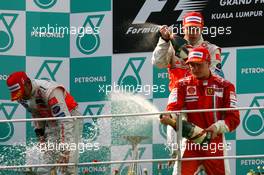 08.04.2007 Kuala Lumpur, Malaysia,  Winner, Fernando Alonso (ESP), McLaren Mercedes, MP4-22, 2nd, Lewis Hamilton (GBR), McLaren Mercedes, MP4-22 and Kimi Raikkonen (FIN), Räikkönen, Scuderia Ferrari, F2007 - Formula 1 World Championship, Rd 2, Malaysian Grand Prix, Sunday Podium