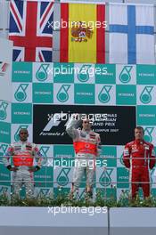 08.04.2007 Kuala Lumpur, Malaysia,  2nd place Lewis Hamilton (GBR), McLaren Mercedes with 1st place Fernando Alonso (ESP), McLaren Mercedes and 3rd place Kimi Raikkonen (FIN), Räikkönen, Scuderia Ferrari - Formula 1 World Championship, Rd 2, Malaysian Grand Prix, Sunday Podium