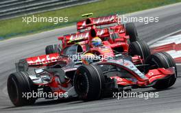 08.04.2007 Kuala Lumpur, Malaysia,  Lewis Hamilton (GBR), McLaren Mercedes, Felipe Massa (BRA), Scuderia Ferrari, Kimi Raikkonen (FIN), Räikkönen, Scuderia Ferrari - Formula 1 World Championship, Rd 2, Malaysian Grand Prix, Sunday Race