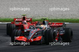 08.04.2007 Kuala Lumpur, Malaysia,  Lewis Hamilton (GBR), McLaren Mercedes, MP4-22 and Kimi Raikkonen (FIN), Räikkönen, Scuderia Ferrari, F2007 - Formula 1 World Championship, Rd 2, Malaysian Grand Prix, Sunday Race